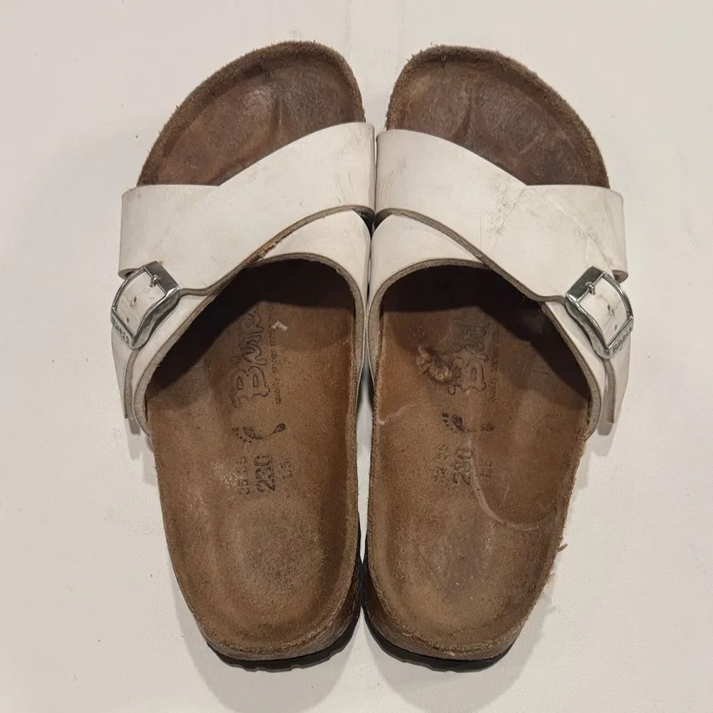 Birkenstock White Cross-Strap Sandals with Silver Buckles